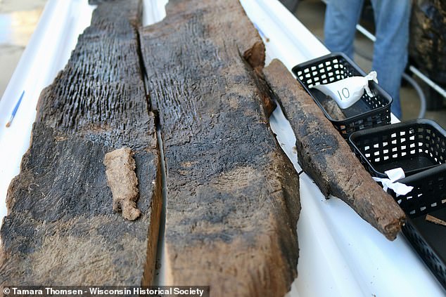 The Wisconsin Historical Society discovered the boats in northern Lake Mendota, which are between 4,500 and 800 years old.  Pictured is a 3000 year old canoe