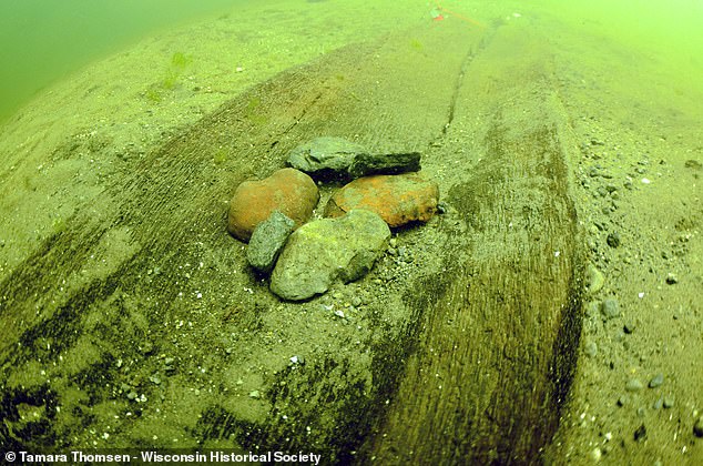 The canoes were found with rocks carefully placed on top of them while they were below the surface, which experts say was done to ensure the boats did not warp during the winter months.