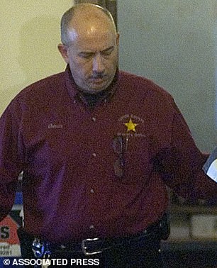 Jay Ostrem is pictured in 2009 while working as a Turner County Sheriff Investigator