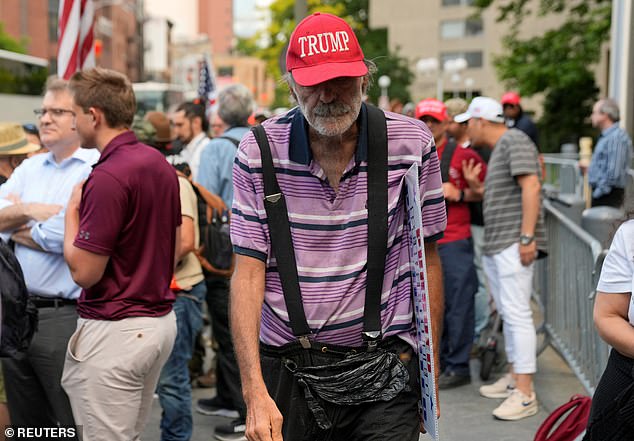 Supporters of Donald Trump look dejected outside the Manhattan courthouse as they hear the former president has been found guilty