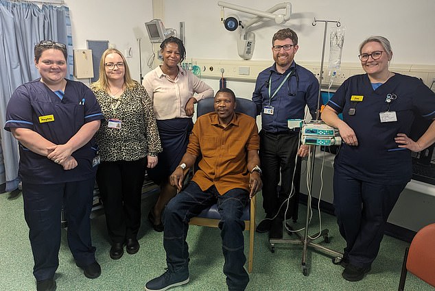 Coventry University lecturer Elliot Pfebv (centre) had no cancer symptoms and was diagnosed through a routine health check with his GP