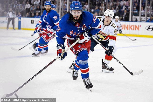 Rangers center Mika Zibanejad (93) skates with the puck in the third period