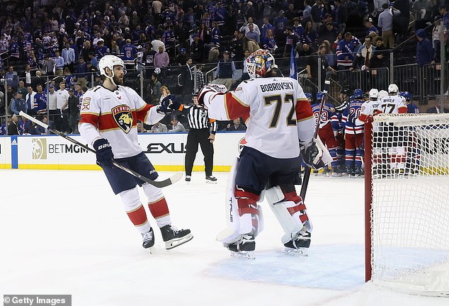 Oliver Ekman-Larsson (91) celebrates with goalkeeper Sergei Bobrovsky after the win