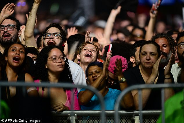 Fans cheer as American pop star Madonna performs during a free concert on Copacabana Beach in Rio de Janeiro, Brazil, on May 4, 2024