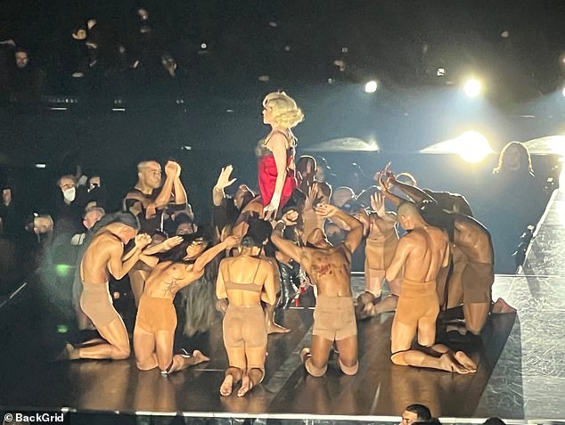 Madonna performs at Kia Forum Stadium in Los Angeles during the Celebration Tour.  This is the same arena where Lipeles was during the concert he's suing her for