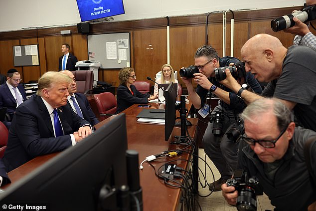 Former US President Donald Trump sits in court during his hush money trial at Manhattan Criminal Court on May 30, 2024