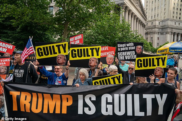 Anti-Trump protesters gather to celebrate Donald Trump's conviction at Manhattan Criminal Court on May 30, 2024