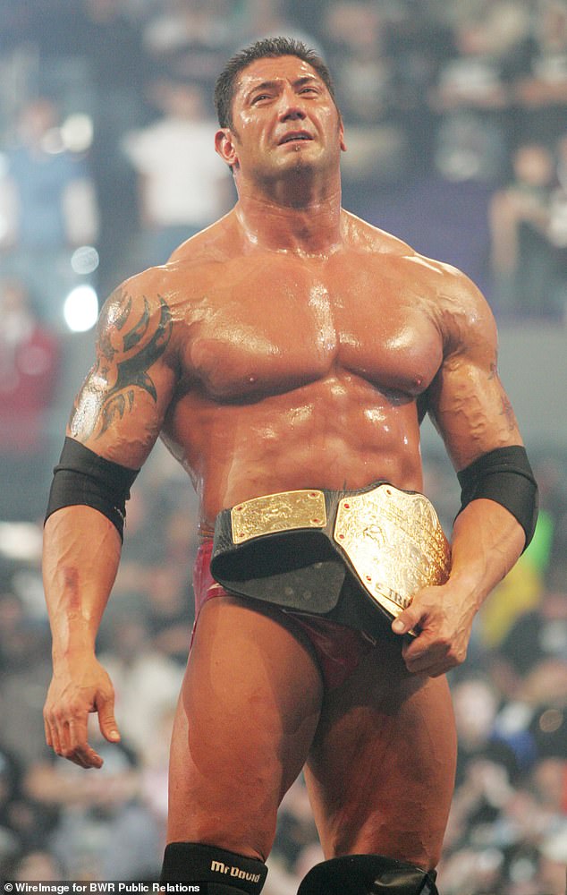 He finally escaped poverty in his 30s, when he launched his hugely successful run in professional wrestling;  pictured at WrestleMania Goes Hollywood in Los Angeles in 2005