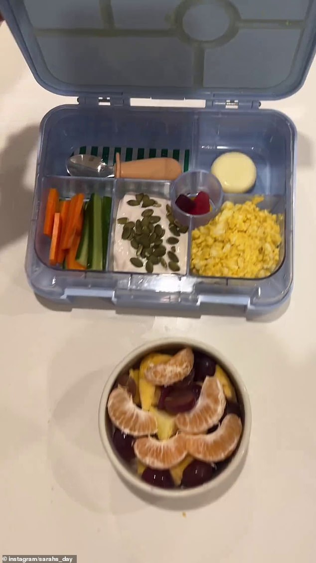 She shared a video on Instagram on Friday of herself packing a range of 'healthy' snacks for him to take to preschool, including curry eggs, cucumber and carrot sticks.