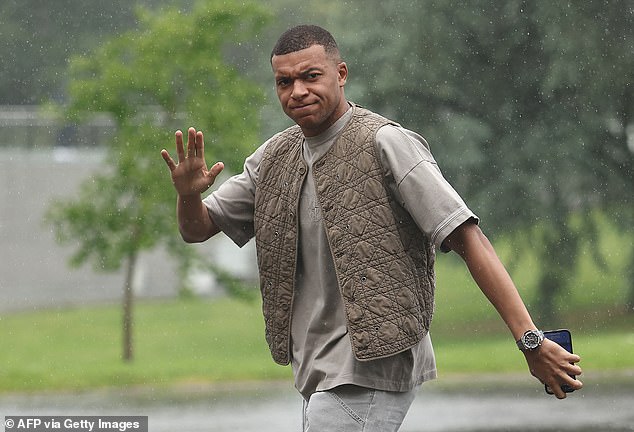 France captain Mbappé cut a businesslike figure in his neutral-toned outfit at training camp