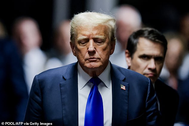 Former US President and Republican presidential candidate Donald Trump walks out to speak to the press after being convicted in his criminal trial at Manhattan Criminal Court in New York City