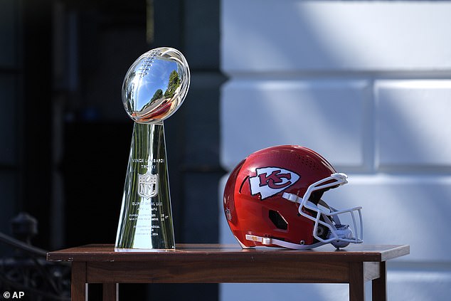 The Lombardi Trophy and a Kansas City Chiefs helmet on display at the White House