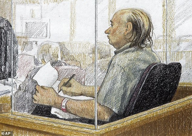 Pickton is shown notes during his trial nearly twenty years ago.  He was eventually convicted of six murder charges in 2007