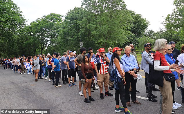 Trump supporters wait in line to enter Crotona Park in the Bronx for the ex-president's rally