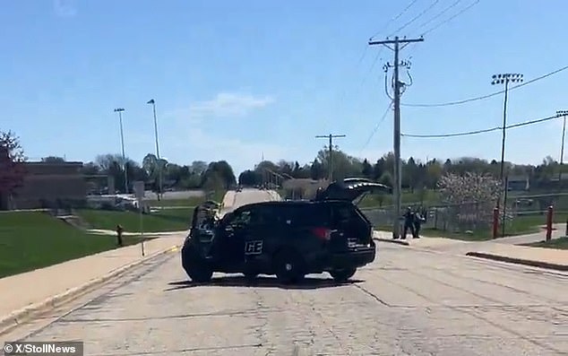 A large police presence was seen outside the high school