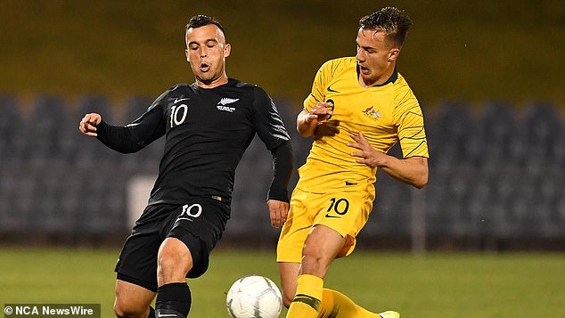 Clayton Lewis (left) plays for New Zealand against the Australian Socceroos in 2019