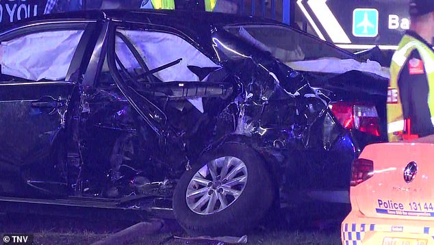 A black sedan involved in the crash had devastating damage to the left rear passenger door
