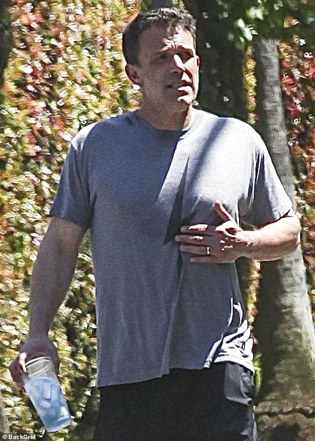 Ben Affleck was still wearing his wedding ring as he stepped out in Brentwood, California, this weekend amid rumors that his marriage to Jennifer Lopez was on the rocks.