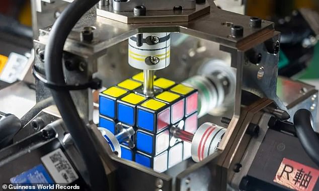 It's a puzzle that can keep most people entertained for hours.  But the Rubik's Cube is light work for one robot, who has officially broken the Guinness World Record for the fastest robot to solve a rotating puzzle cube