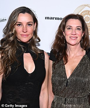 Delphine and older sister Alexandra at an event in LA last March