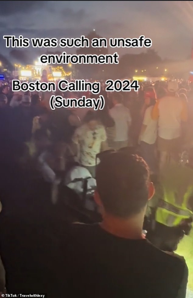 Pictured: A young woman attending Sunday's Boston Calling was escorted from the concert site on a stretcher.  The person who posted the video said many others should receive the same treatment