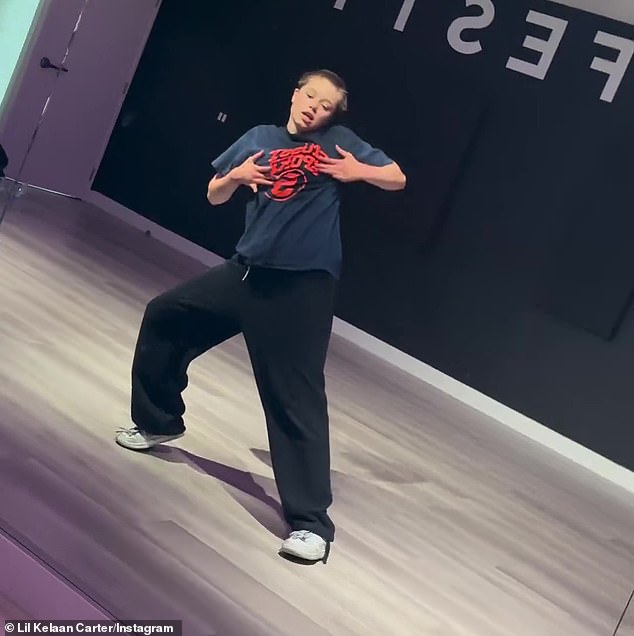 Shiloh wore a sweatshirt and an oversized T-shirt as she showed off her impressive moves while Carter wrote, “Her movement is crazy.  Thank you for your energy'