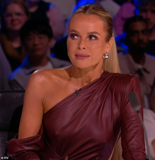 Amanda Holden caught the attention of Britain's Got Talent viewers on Monday during the first semi-final of the series as she wore a revealing burgundy dress