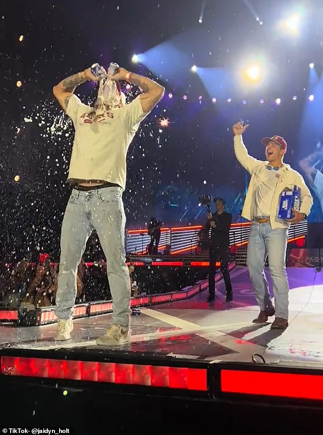 Brock Purdy and George Kittle made a surprise appearance on stage with Luke Combs