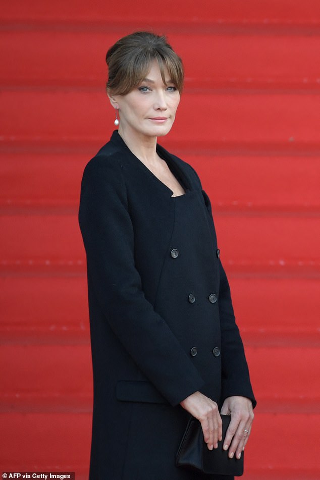 Former French first lady and supermodel Carla Bruni (pictured) was questioned by police today as a crime suspect in a major corruption case
