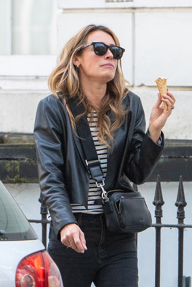 The TV presenter looked in good spirits as she treated herself to an ice cream in Primrose Hill as she embraced the start of London's summer