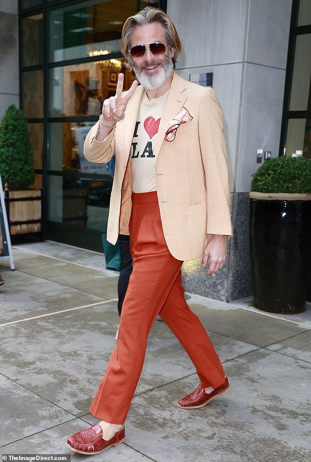 Chris Pine once again provided a quirky look in an 'I [heart] LA” t-shirt as he stepped out to promote his latest film Poolman in New York City on Wednesday