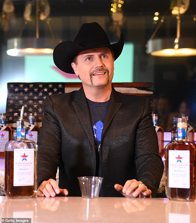 Country singer John Rich weighed in on a debate about the Covid-19 vaccine, questioning its impact on humanity