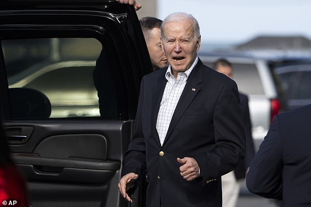 US President Joe Biden responds to questions from reporters as he leaves St. Edmond's Roman Catholic Church in Rehoboth Beach after attending Mass on Sunday