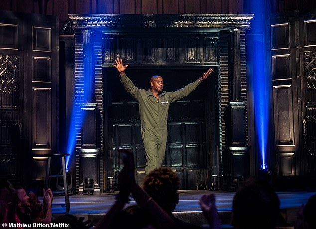 About halfway through, in an extended comedy set, Chappelle initially said his friends had told him he should or shouldn't discuss the war.