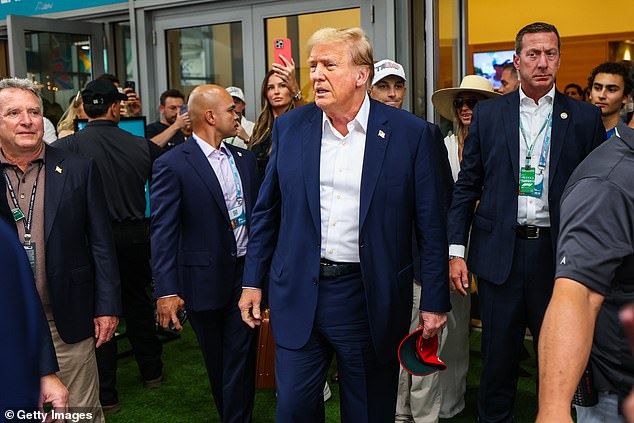 Donald Trump has arrived at the Miami Grand Prix flanked by heavy security