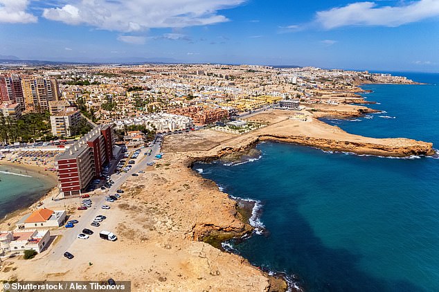 (File image of Alicante coastline) A drunken British man has been arrested at Alicante airport after being drunk on board and trying to open the door mid-flight