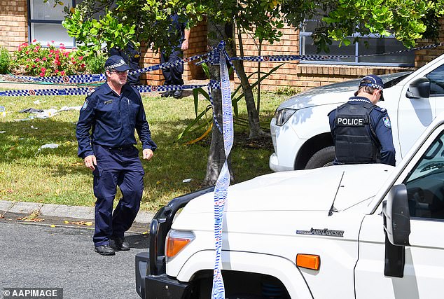 Police officers are pictured at the scene of the crime on December 27, 2022, the day after Emma was murdered