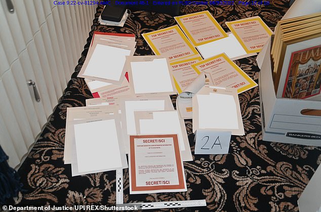 A photo included in the lawsuits filed by the Department of Justice on August 30, 2022, showing a collection of flagged documents seized during the August 8, 2022 FBI raid on Mar-a-Lago