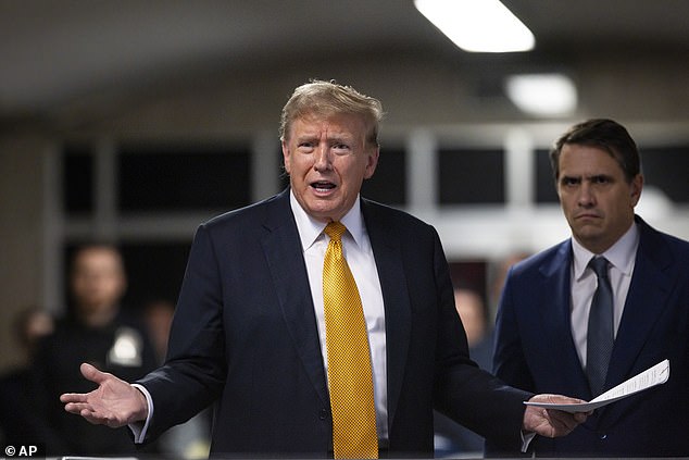 Former President Trump speaks in Manhattan Criminal Court on May 21, 2024.  He is charged in a separate case with mishandling classified documents after leaving the White House