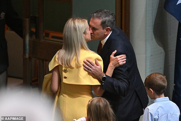 Federal Treasurer Jim Chalmers Kisses Wife Laura After Delivering 2024-2025 Budget