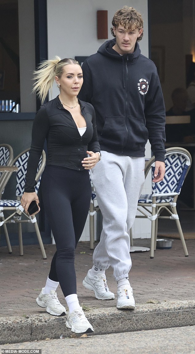 Rabbitohs star Campbell Graham has attracted attention after being spotted with a glamorous mystery woman in Sydney's east (pictured)