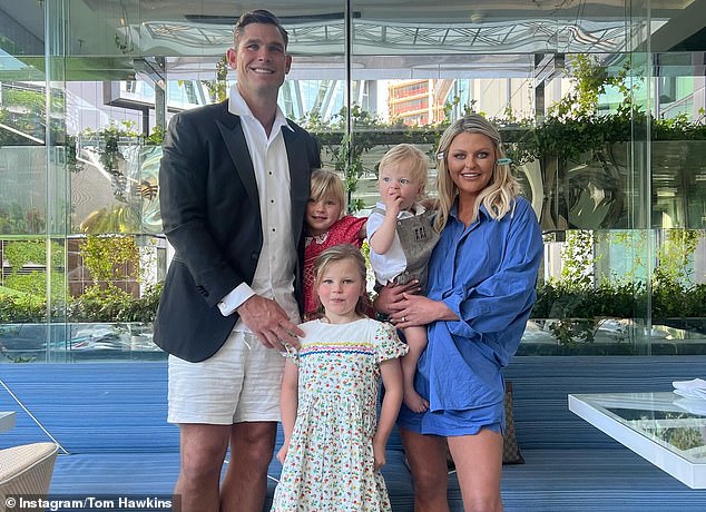 Tom Hawkins (pictured with his family) has spoken about how the loss of his mother remains the biggest challenge he faces in his long and glittering career