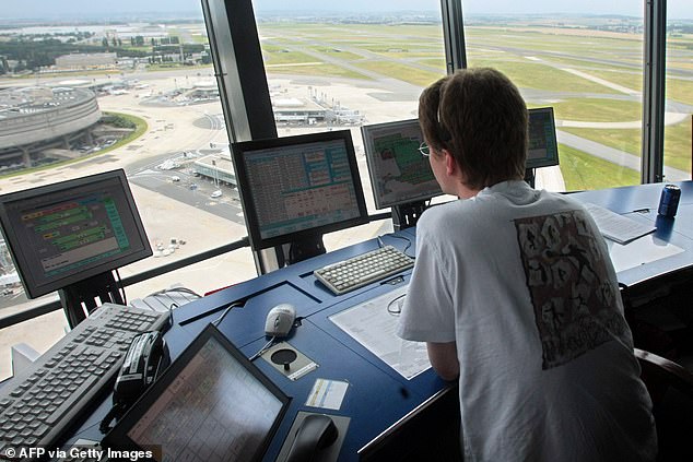 Controllers have high salaries of up to £93,000 per year and work 32 hours per week.  File image shows the air traffic controller at Roissy Charles de Gaulle Airport