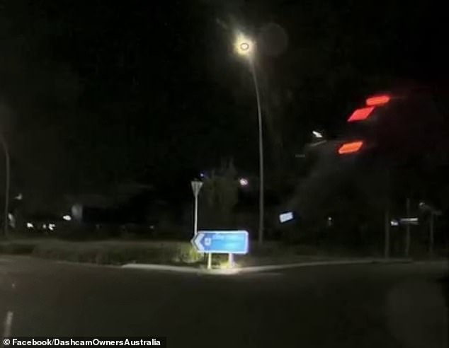 You see the white vehicle flying through the air (photo) before it crashes into the street sign