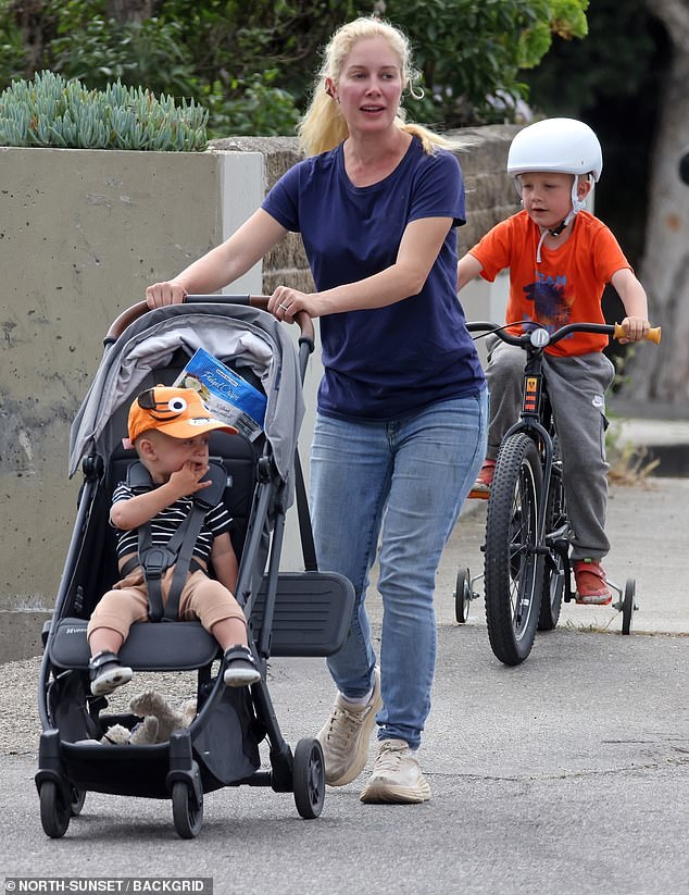 Heidi Montag, 37, kept it casual as she enjoyed a relaxing walk with her two sons in the beach town of Carpinteria, California, on Sunday