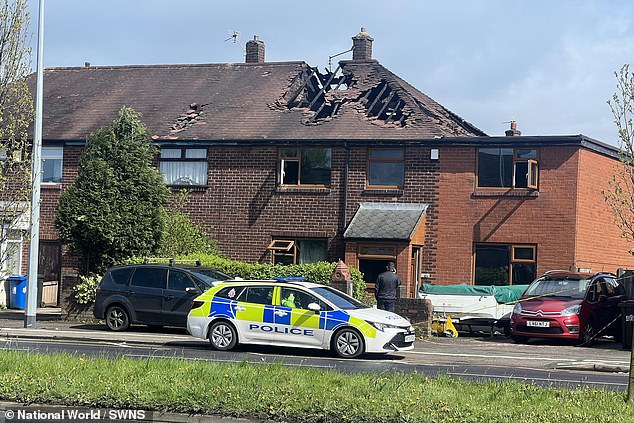 A photo of the destroyed house in Wigan, Greater Manchester, where a house fire broke out on April 14