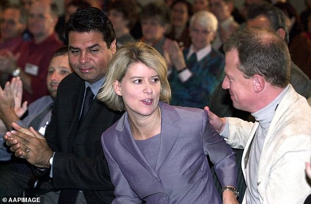 Pictured: Natasha Stott Despoja is congratulated by her then fiancé Ian Smith after giving a speech at the Democrats' Conference in Canberra in 2002. The couple married the following year