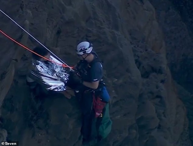 Shortly after lunch on Sunday, a crew of NSW Ambulance paramedics abseiled down the jagged rock face to help get Mr Hart to a spot where he could be safely lifted to a helicopter.