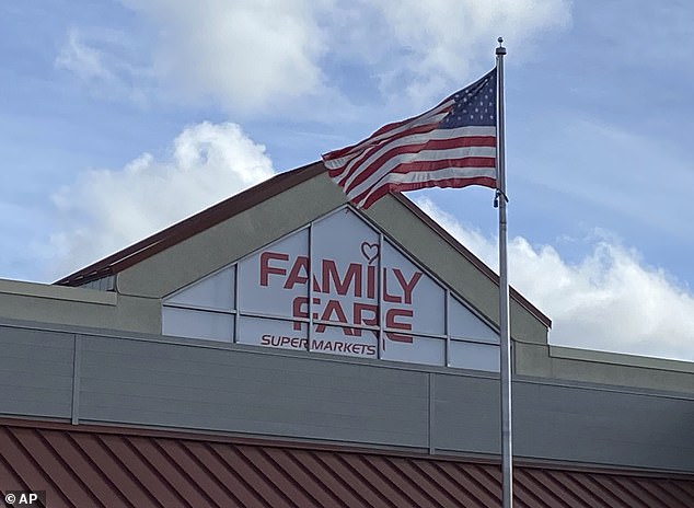 The homeless woman was found alive behind the sign at the Family Fare supermarket last month.  The triangular sign is approximately 1.80 meters wide and 2.5 meters high.  Officials said there is also a door accessible from the roof