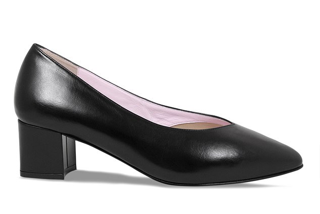 A Sole Bliss 'Ingrid' black leather shoe worn by the queen above